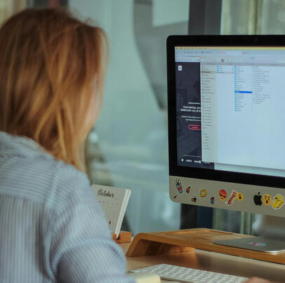 Certitranslations.com translator working on a legal Italian to English translation at her desk in Florence.