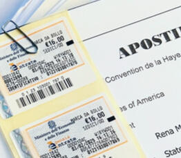 English to Italian sworn translations with 16 euro revenue stamps being prepared for court appointment in Tuscany.
