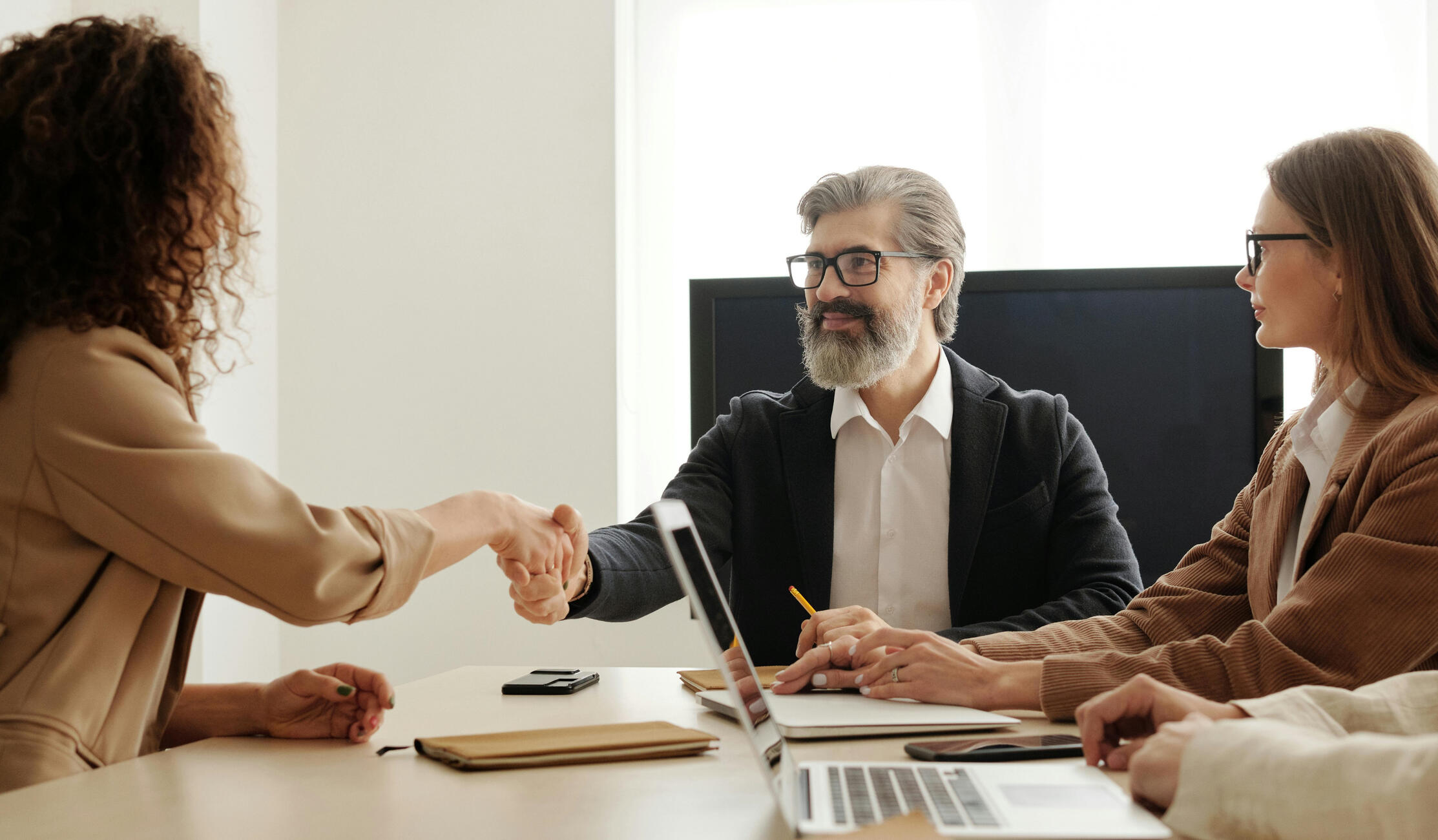 An interpreter translates into English during the signing of a a notarial deed to purchase a property in Tuscany, Italy